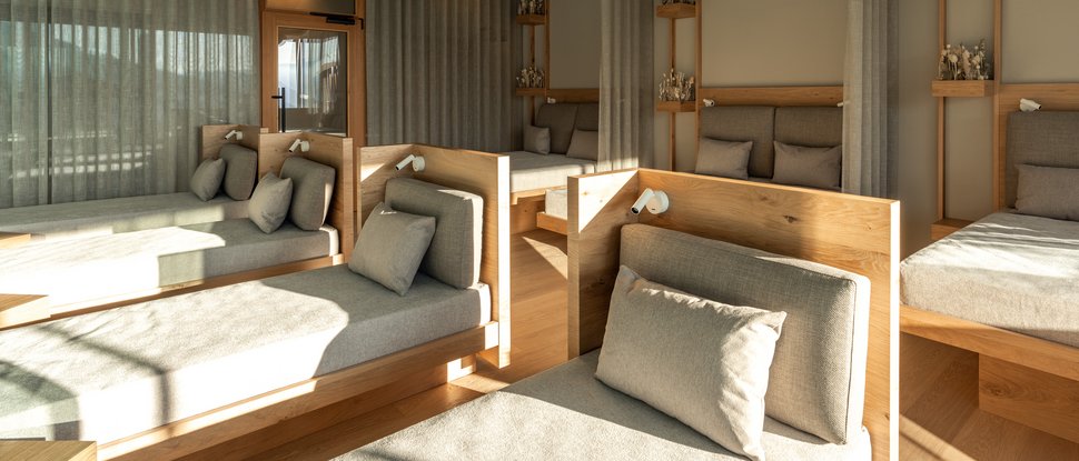 Current news and stories from Olang Modern relaxation room with comfortable loungers and wood decor in natural light