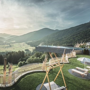 Our Sky Pool in South Tyrol, a rare beauty Luxury resort with infinity pool in the mountains at sunset