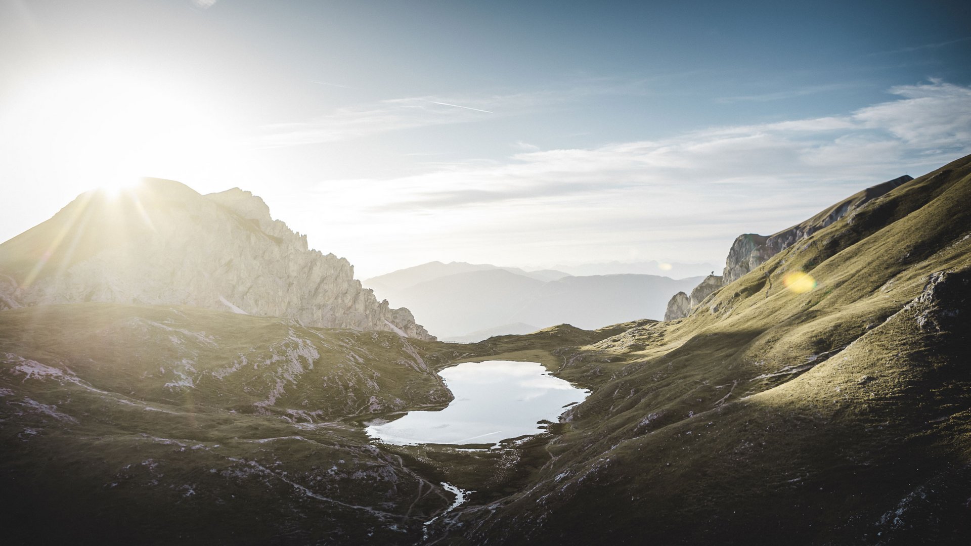 Certified quality for you Sunrise over a mountain lake in an alpine valley