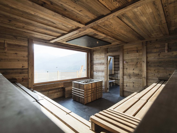Bruneck: shopping & more Modern sauna with large window and mountain view