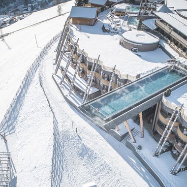 Our Sky Pool in South Tyrol, a rare beauty Heated outdoor pool at a snowy mountain resort